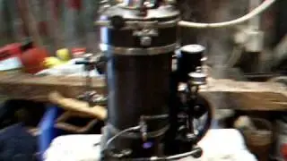 Bing 130/114 vertical steam engine under power.