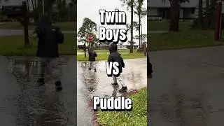 Puddle mode: ON 💦 #twins  #parentinghumor #rainyday #twinboys #toddlerlife #familycontent #shorts