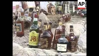 Taliban close offices of Christian aid group + destroy alcohol