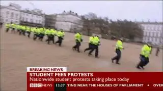 Police vs protesters Benny Hill style!