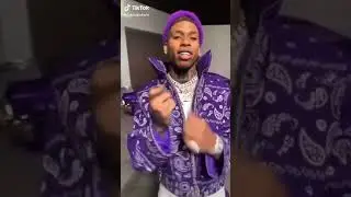 NLE Choppa throwing gang signs