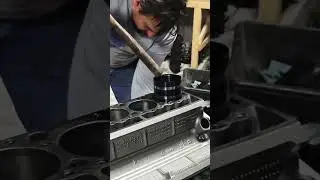 Installing the pistons in the block making sure the studs don't hit the crank on the 6.5l Diesel!