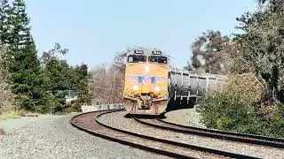 UP 5634 leads grain train with a end DPU