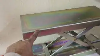 Manual operated lift for two wheeler