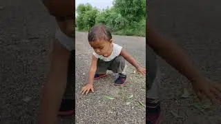 Girl baby exploring the road in 1.7 years