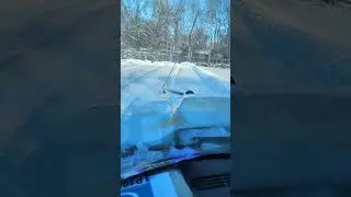 Snow plowing a small parking lot
