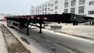 China Custom 3 Axles 4 Axles 40ft 48ft 53ft 60ft Container Flat Bed Flatbed Semi Trailer for Sale