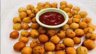 ഉരുളകിഴങ്ങും റവയും കൊണ്ട് ടേസ്റ്റി പലഹാരം ||Potato rava balls#banuworld