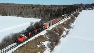 Awesome Aerial 4K View! CN 100 Gevo 3240 Leads Manifest Train CN 594 West past Alison, NB