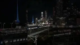 noisy late night train service on a clear night in Melbourne