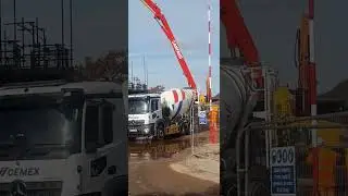 Mercedes concrete truck spinning at high speed pumping top of car park