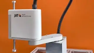 SCARA positioning robot as complete automation solution