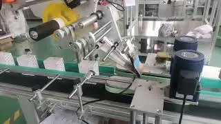 Small box top plane surface labeling machine- SKILT machinery