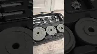 A set of dumbbells and a barbell