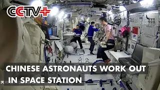 Chinese Astronauts Work Out in Space Station
