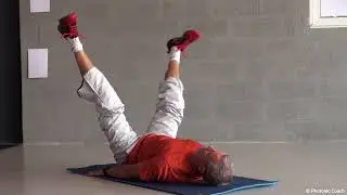 Ex 12   Tapis de Gym   Relev&eacute;s de bassin avec mouvements circulaires dans l&rsquo;autre sens