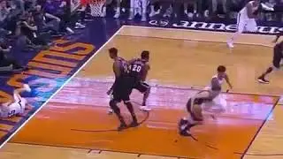 Hasaan Whiteside blocks Mike James layup and stares him down