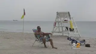 Unsafe Water Keeps Beach-Goers On The Shore