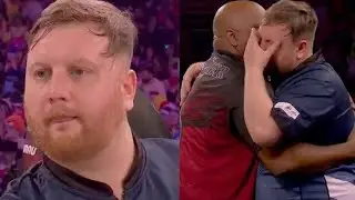 Darts star in tears during World Championship match after appearing to make rude gesture