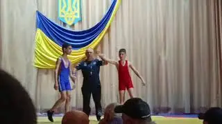 #WRESTLING.My name is Butor Mark. Today, there's wrestling competition. Here's my first bout. I won.