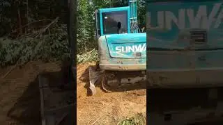 Excavator Rescuing Overloaded Log Truck on Dangerous Jungle Road