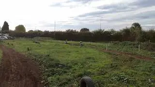 Racing on the stomp 120, on a very muddy track