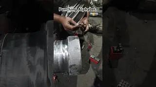 punching alphabet on metal