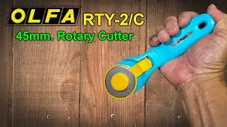 OLFA RTY-2/C 🟠 Rotary Cutter 45mm. Smooth and sharp, with an unusual color scheme compared to Olf...