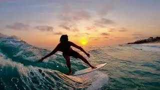 Skimboarding at Sunset in Laguna Beach California