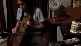 talented and beautiful intellectual teaches herself how to play violin uke and rules at it