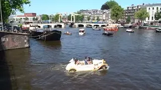 Boating in Amsterdam:  A beautiful day on the the canals / saturday 08-07-2023