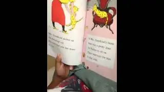 Kota reading The Fire Cat