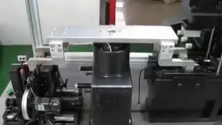 Two station armature balancing machine