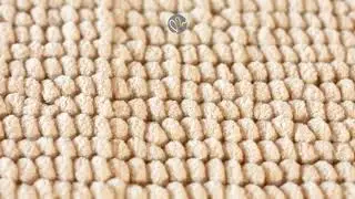 L&rsquo;insuperabile ciniglia, soffice e super assorbente, del tappeto da bagno Corn by OLIVO.shop