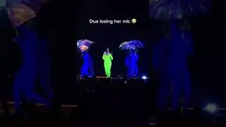 Dua Lipa Drops Microphone On Stage While Performing