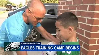 Young Eagles fan waits for team ahead of training camp