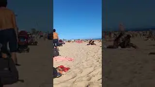 Beach in Carcavelos,Portugal | a lot of peoples come to beach with nice sunny weather ;)