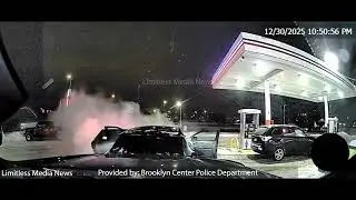 Brooklyn Center Police Push Electric Car With Battery Fire Away From Gas Station Pump With Squad Car