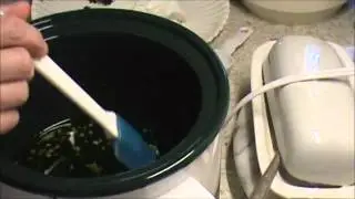 Making comfrey salve with beeswax