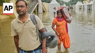 New Delhi family seeks relief from some of the worst flooding in northern India in decades