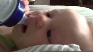 Teasing Tommy with his bottle