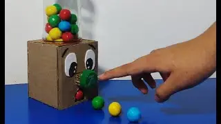 cómo hacer máquina expendedora Gumball con cartón reciclado - maquina casera de goma de mascar