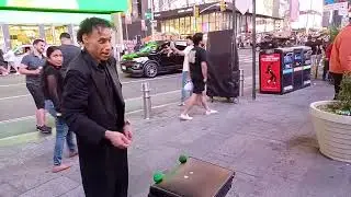 MR. RAMON THE AMAZING ILLUSIONIST STREET MAGICIAN AT TIMES SQUARE MANHATTAN NEW YORK CITY