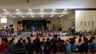 Parker Woods students, staff, and parents sing a twentieth anniversary Happy Birthday to their schoo
