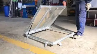Trampilla con ayuda hidr&aacute;ulica