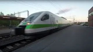 Pendolino train arrival and departure Pieks&auml;m&auml;ki railway station 4K video