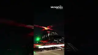 Bell Helicopters ready for departure at night