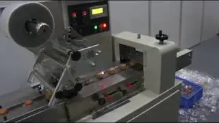 Automatic flow pack wrapper, packaging machine for bread, cake, biscuit