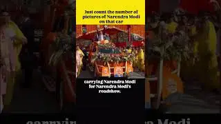 Four pictures are placed on the front grille of the orange vehicle.#video #new #shortvideos #nothing