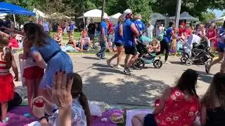The Coast Guard Parade floats through Grand Haven